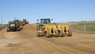 Grade King and Roll-N-Go working the haul road