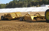 Grade King and Roll-N-Go working dirt